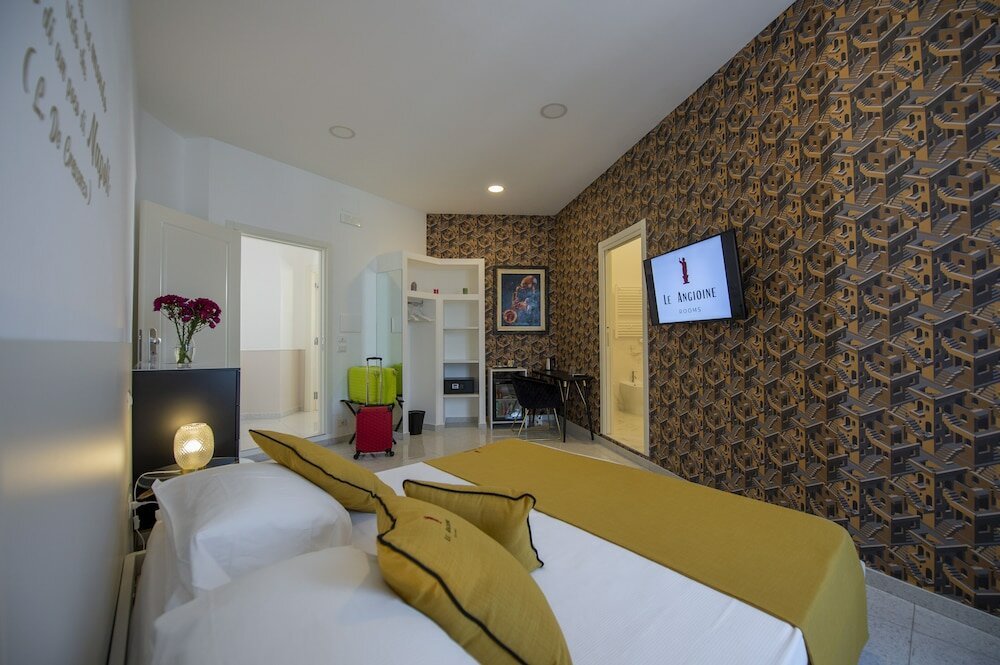 Фото Le Angioine Rooms