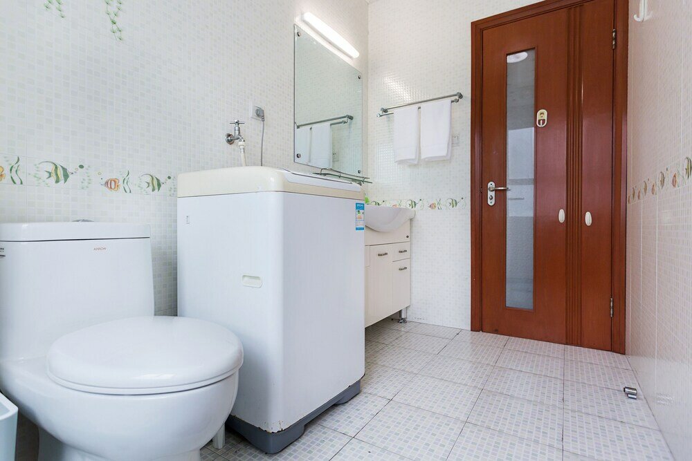 Фото Good Time Travellers Inn- Shanghai New International Expo Apartment