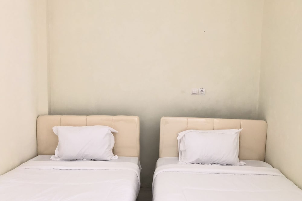 Фото Oyo 90299 Corner Guest House