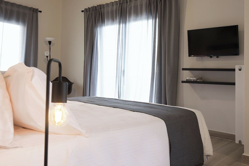 Фото Aellō luxury apartments