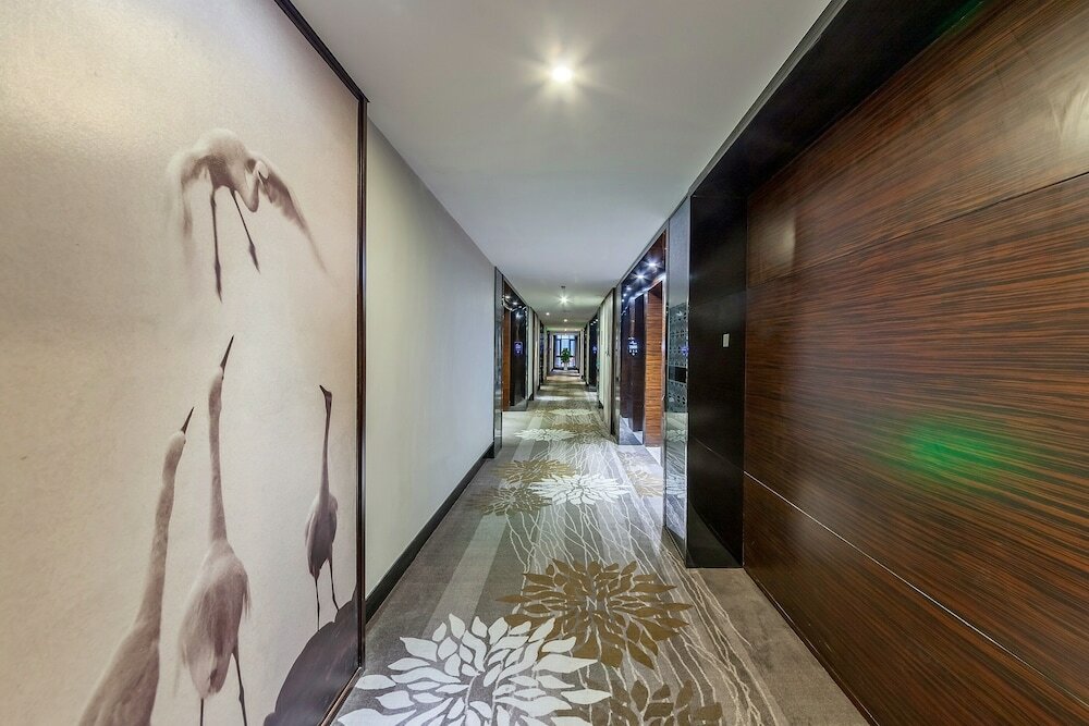 Фото Tianyuan Junlong Hotel