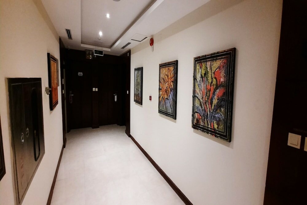 Фото The Blue Rose Hotel - الورده الزرقاء للوحدات السكنيه