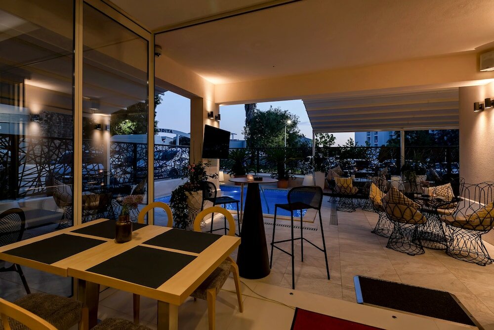 Фото Aparthotel Flora