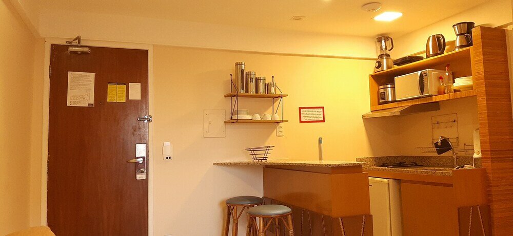 Фото Completo em Hotel Localização Perfeita