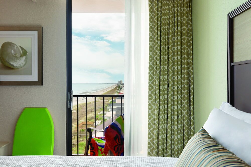 Фото Surfside Beach Oceanfront Hotel