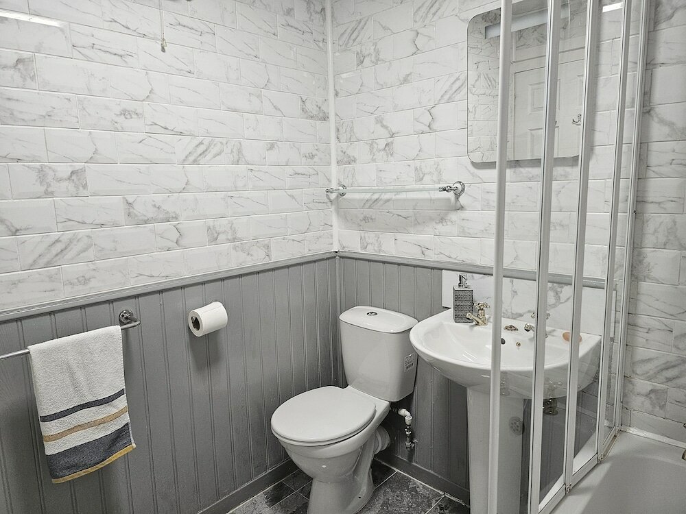 Фото Snug - Colquhoun Square Apartment