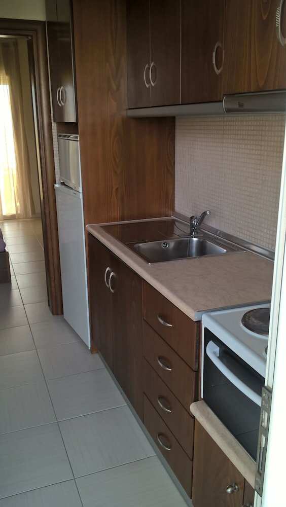 Фото Kyparissis Rooms