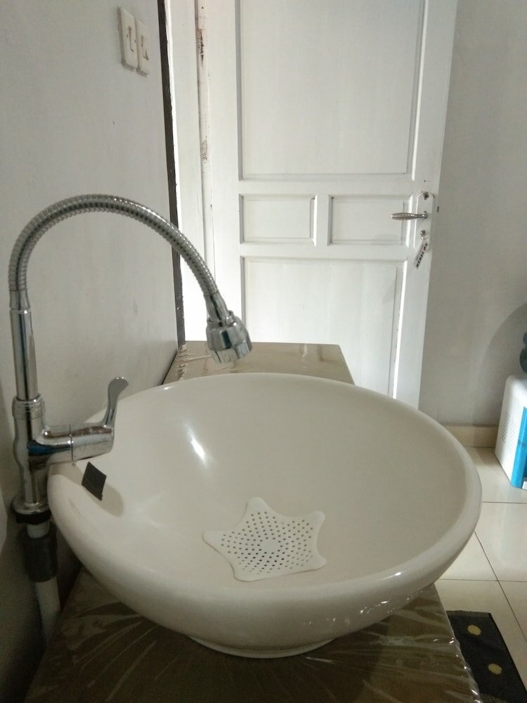 Фото Penginapan Bunar Tunggal