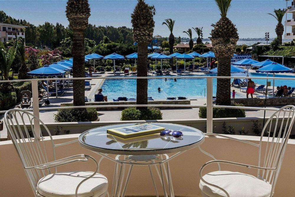 Фото Mitsis Ramira Beach Hotel - All Inclusive