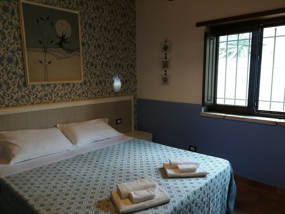 Фото Agriturismo i Tre Ulivi