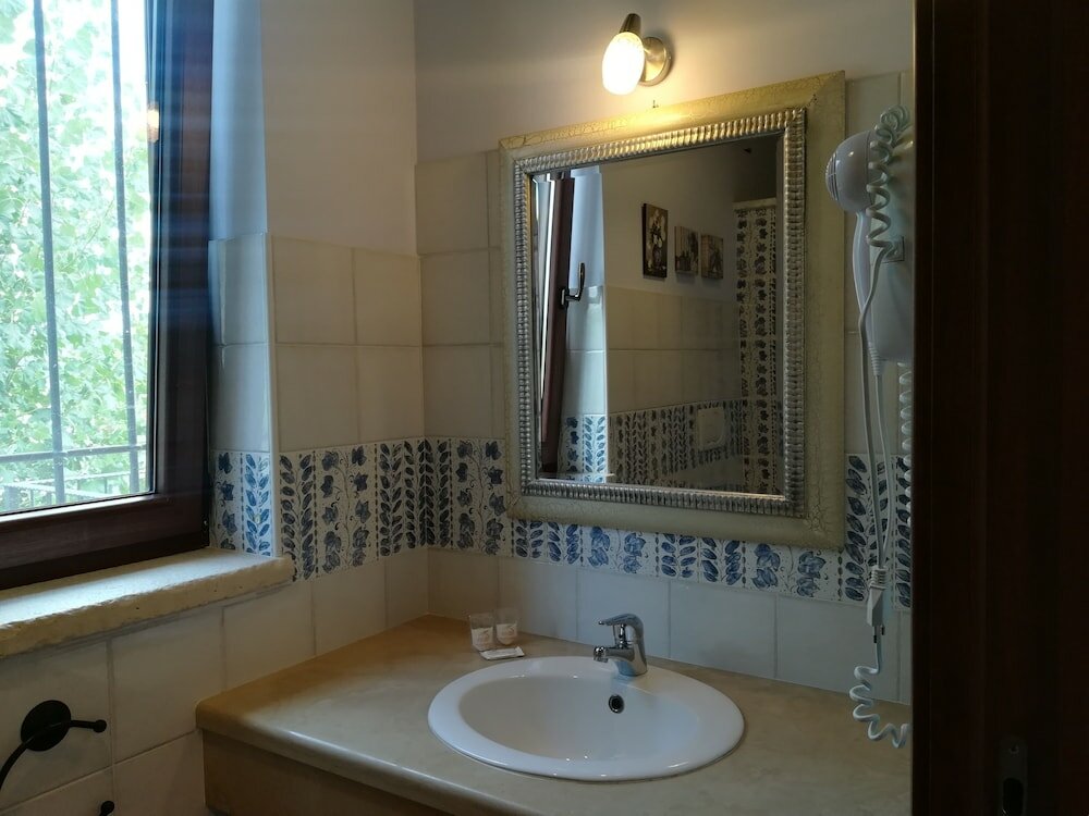 Фото Agriturismo i Tre Ulivi