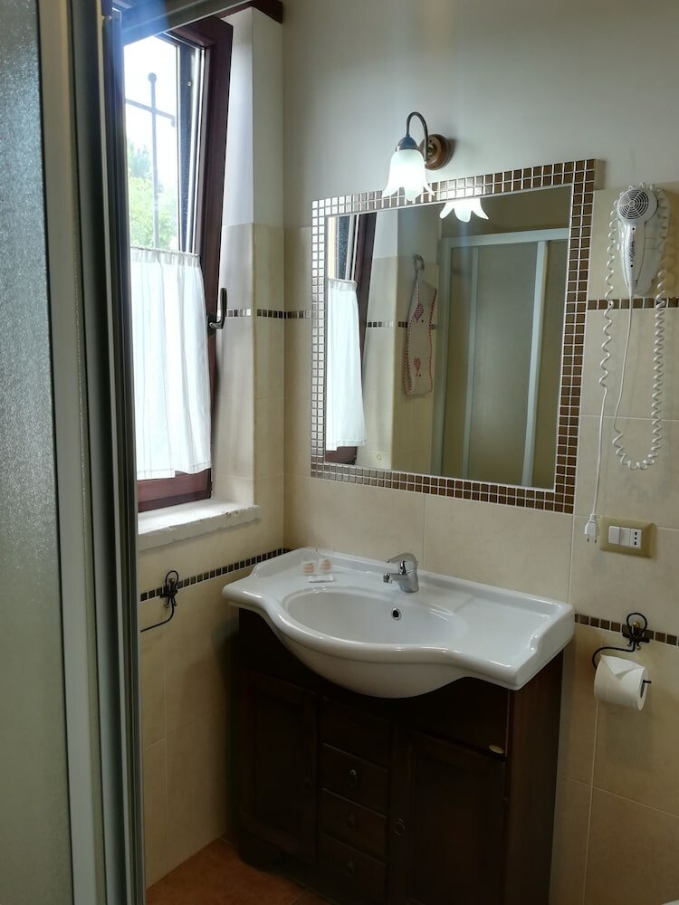 Фото Agriturismo i Tre Ulivi