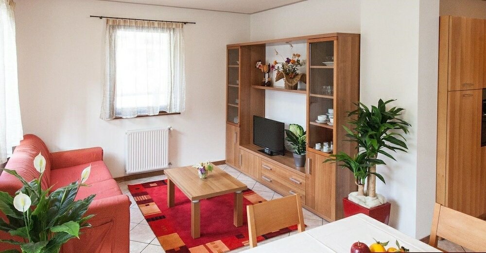 Фото Appartamenti Enrosadira