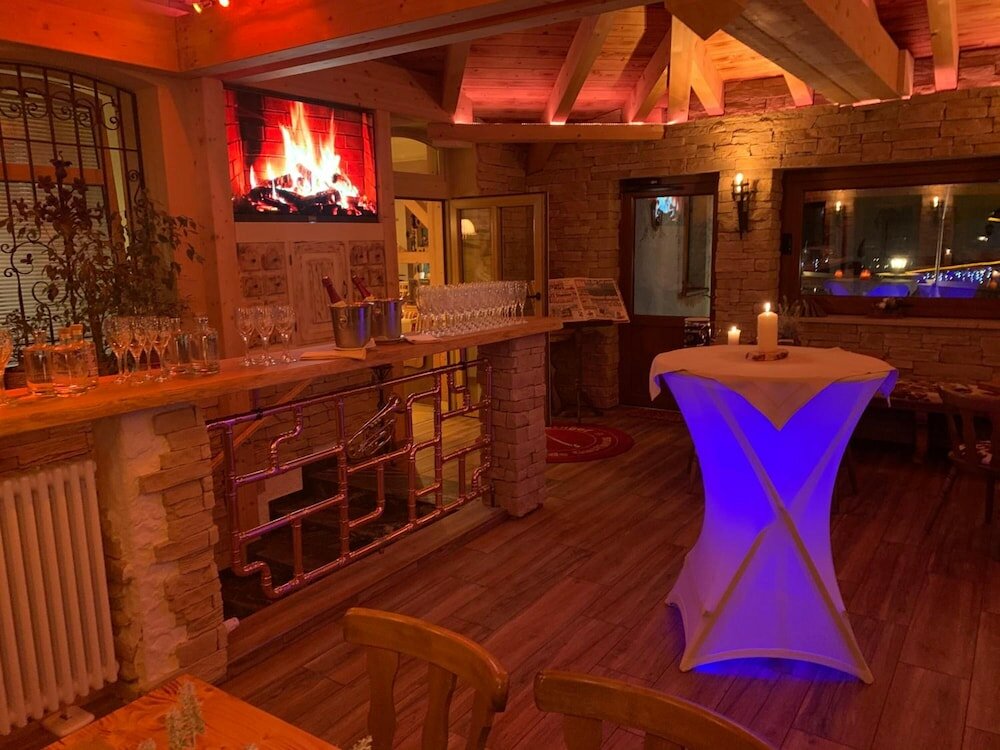 Фото Hotel Alpenhof Das klingende Gasthaus