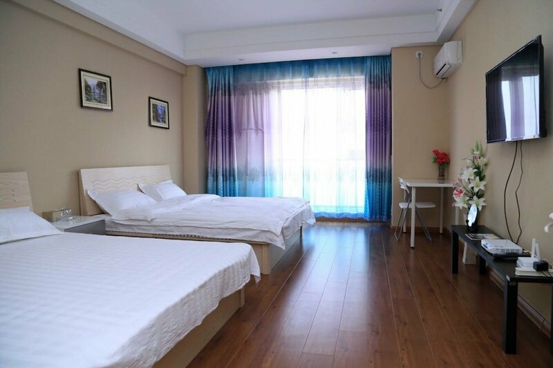 Гостиница Dalian Aolai Hotel Apartment в Даляне