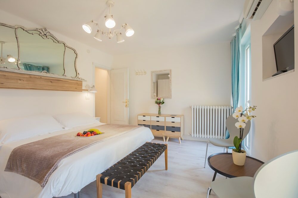 Фото Corte Realdi Boutique Rooms Garda