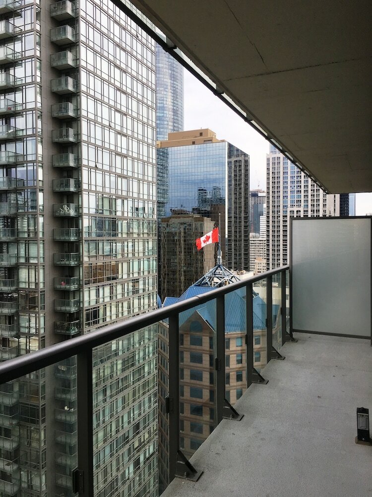 Фото Altitude Suites Bay Street by Teristo Group