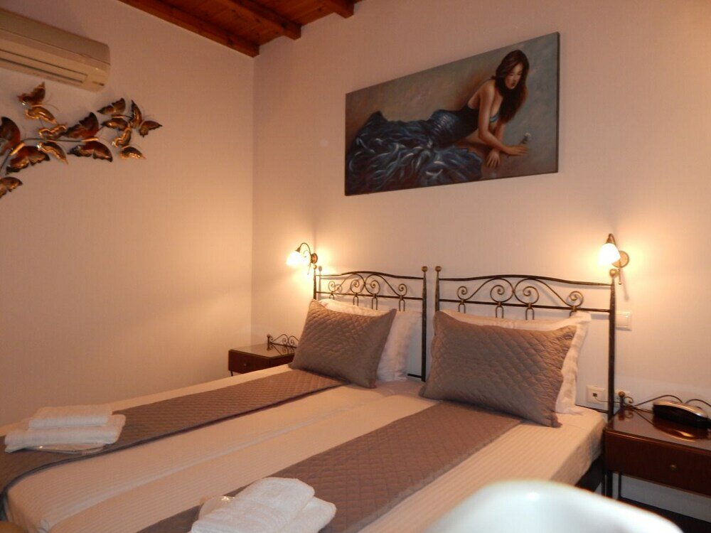 Фото Tinos Suites & Apartments