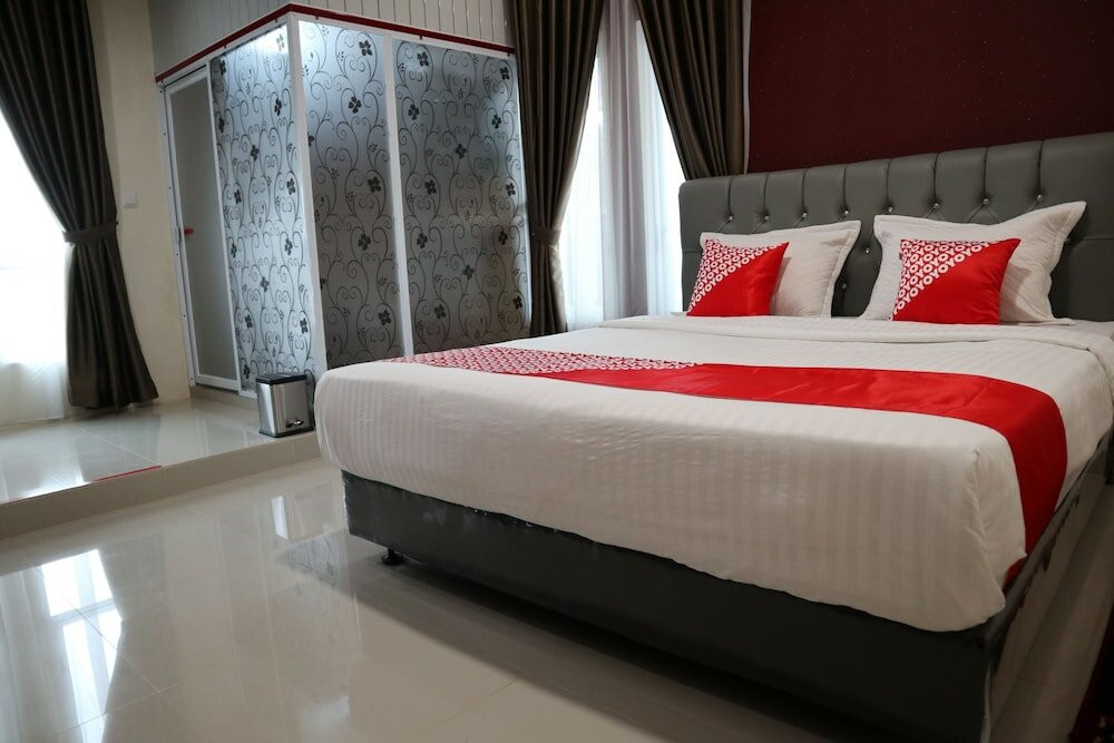 Фото Oyo 1648 Penginapan Three Joye