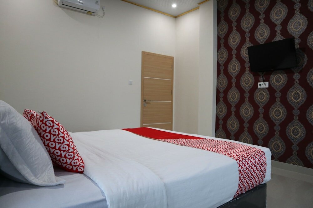 Фото Oyo 1648 Penginapan Three Joye