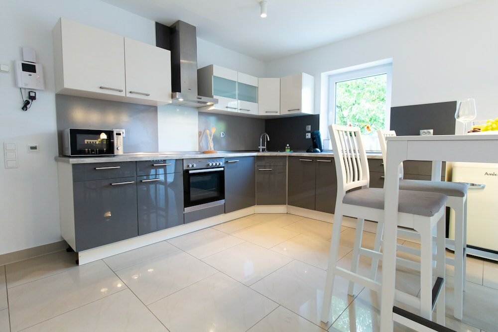 Фото T & T Suites Raunheim