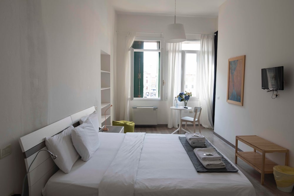 Фото Ca' Garibaldi Rooms