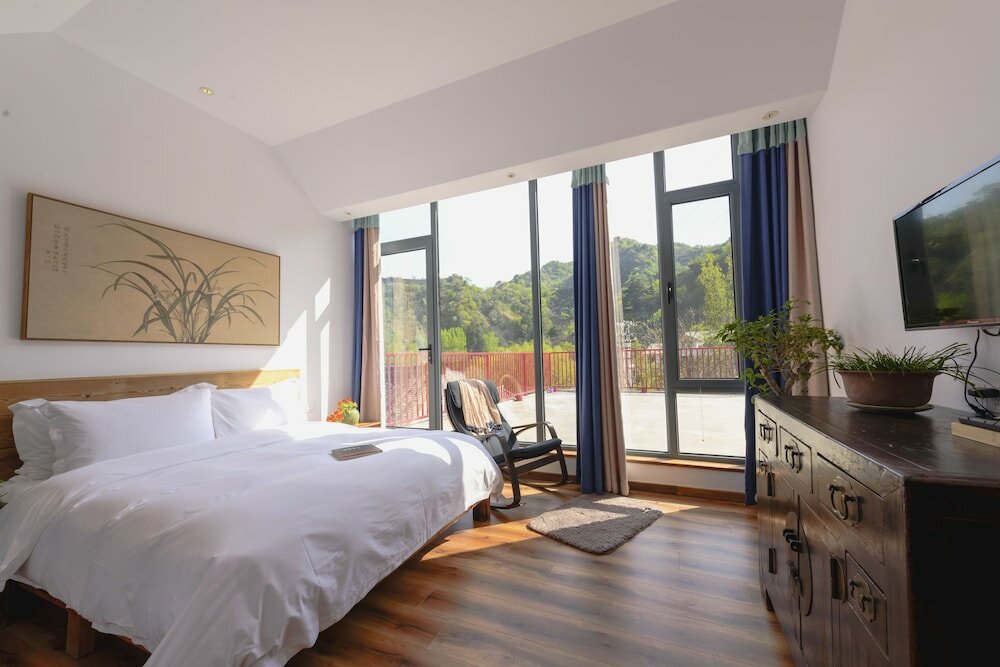 Фото Lotus Mountain Boutique Inn