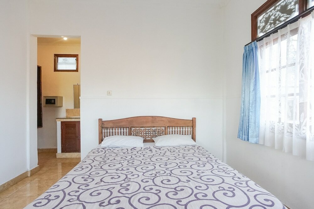 Фото Indopurejoy House - Komala Indah Cottages