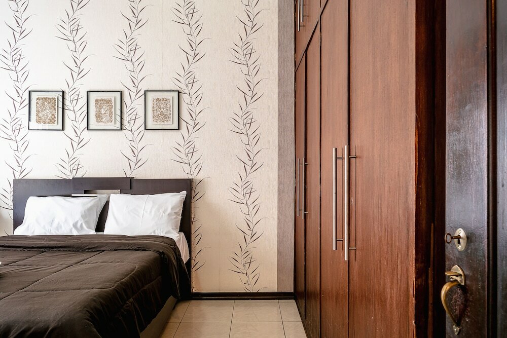 Фото Ape tamanho família com garagem