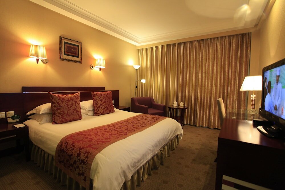 Фото Overseas Chinese International Hotel