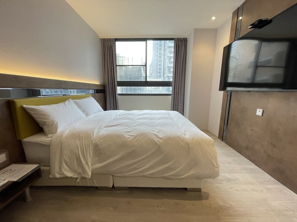 Фото Check inn Taichung Qinghai