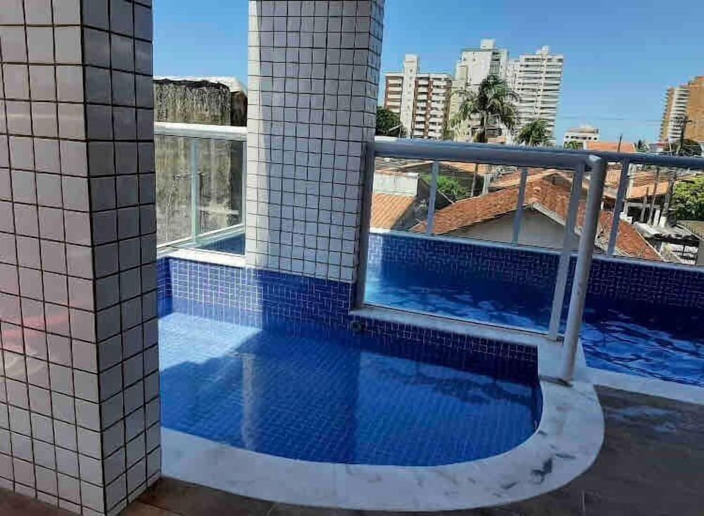 Фото Lindo apto com piscina em Praia Grande