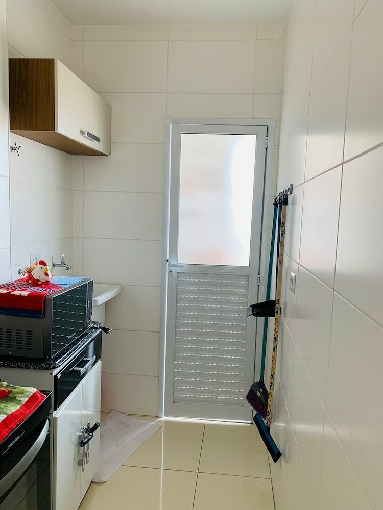 Фото Lindo apto com piscina em Praia Grande