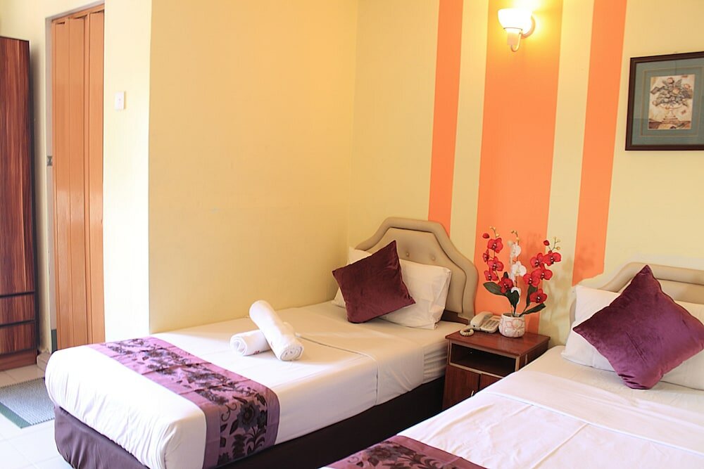 Фото Sun Inns Meru Raya