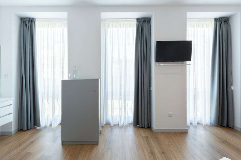 Фото Serra do Pilar Porto Suites