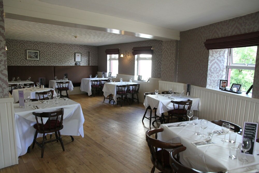 Фото 5 Corners Guest Inn