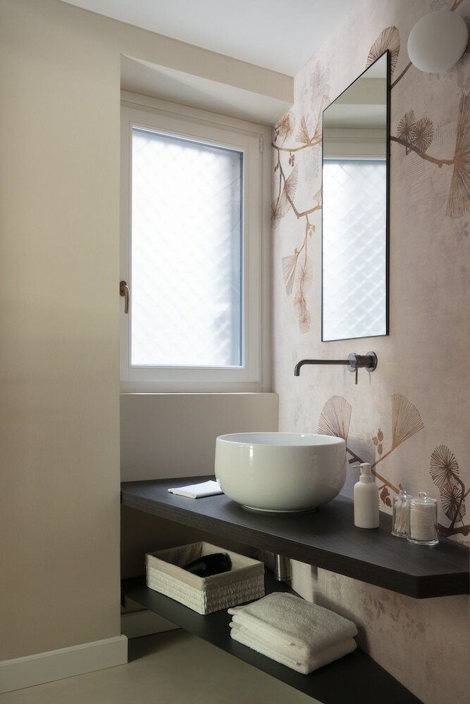 Фото Della Spiga Suites by Brera Apartments