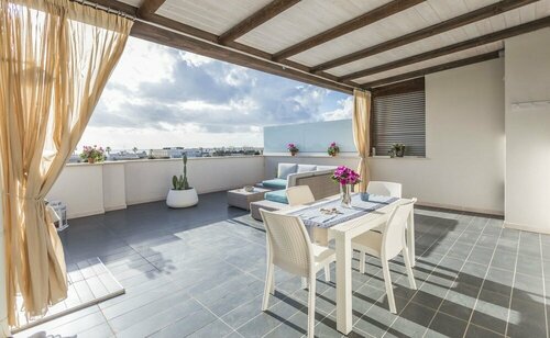 Гостиница Attico Vista Mare Dune Porto Cesareo