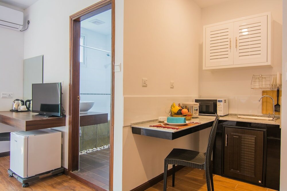 Фото Woodside Inn & Serviced Apartments