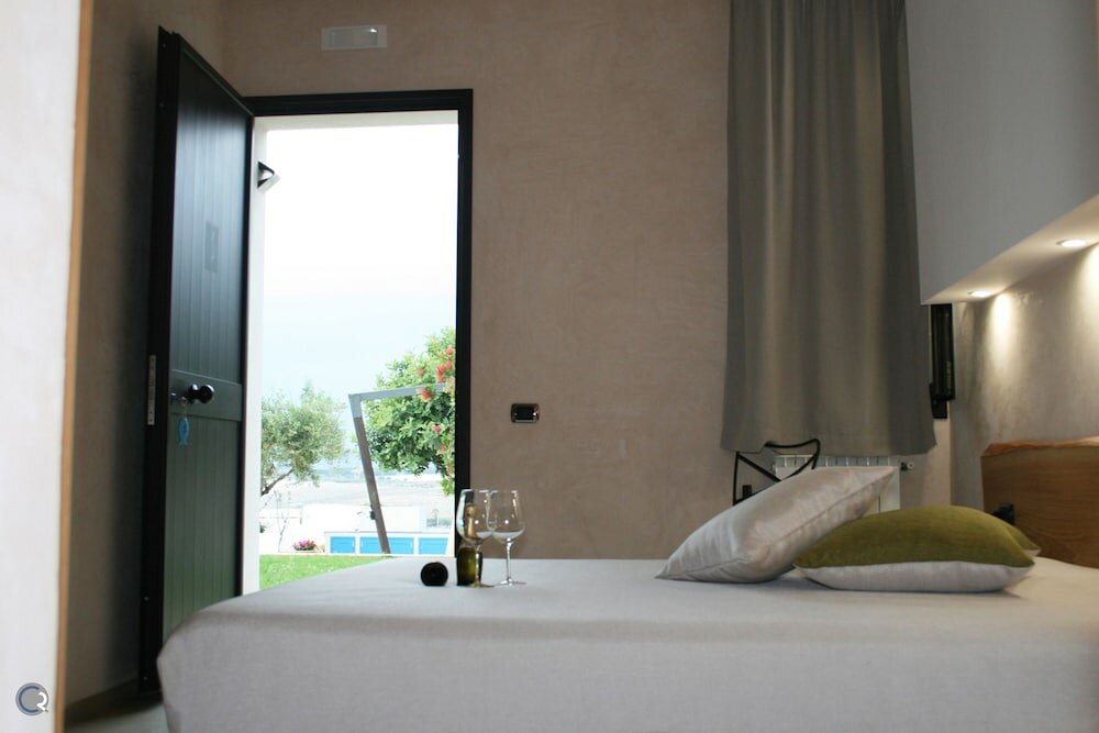 Фото Punta Bianca Suite&Home Experience