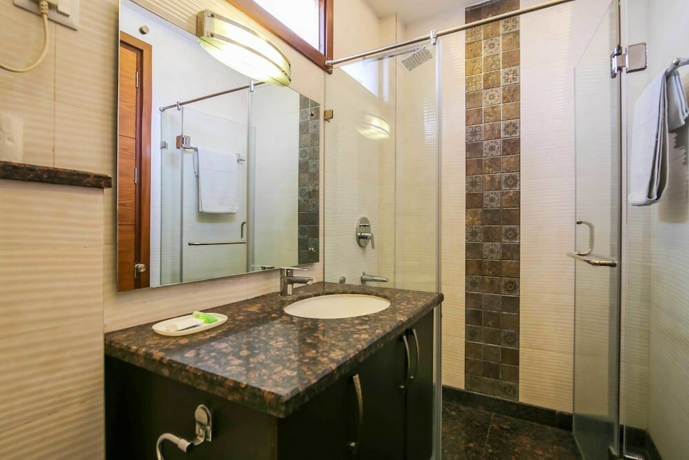 Фото Woodpecker Service Apartments Green Park