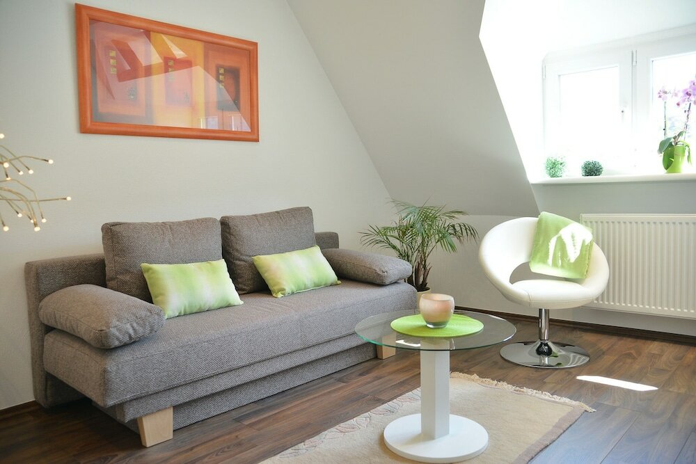 Фото Sonnenhaus Ferienwohnungen