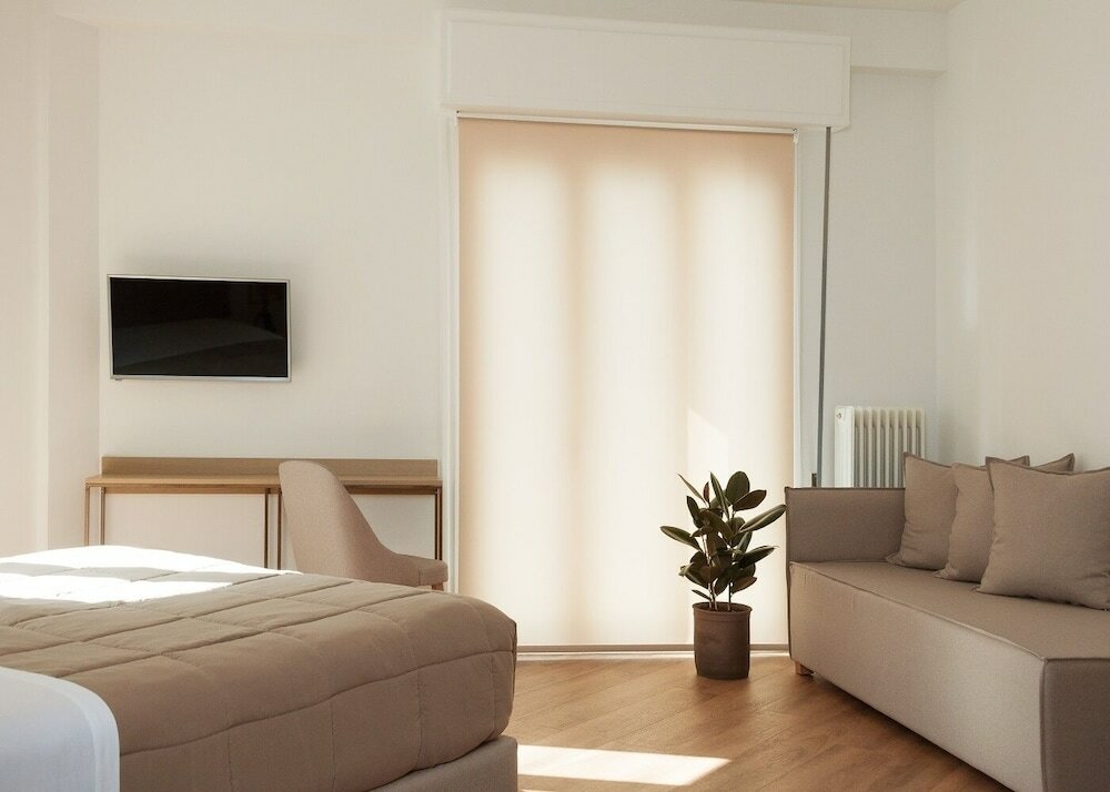 Фото Voulis Attico Rooms & Apartments