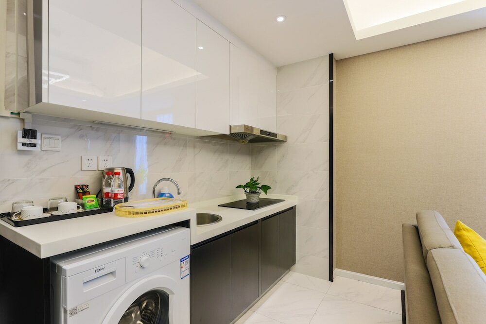 Фото Yue Qi Hotel Apartment