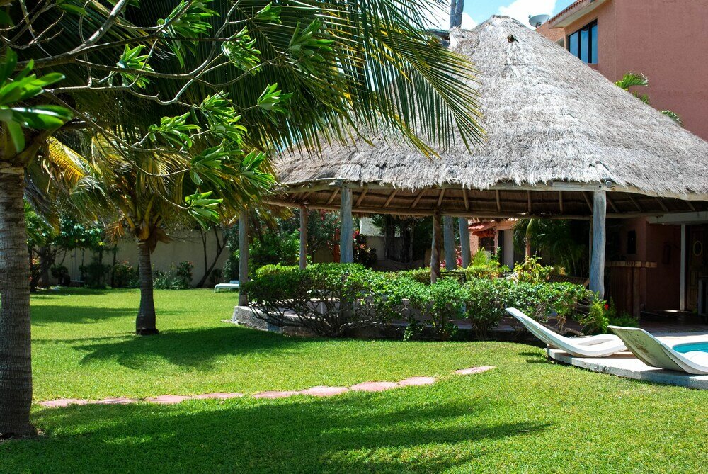 Фото Pok-Ta-Pok Guest House