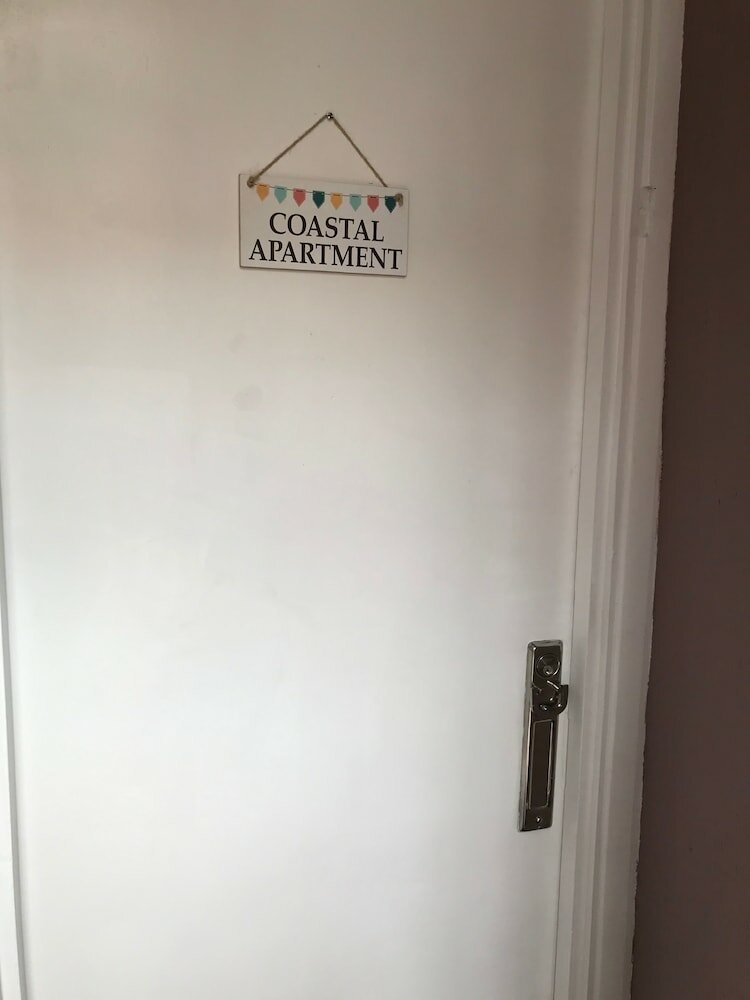 Фото Coastal Apartment