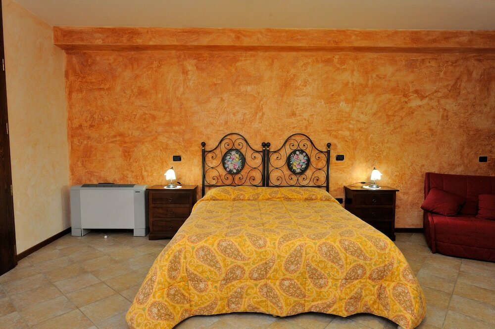 Фото Agriturismo Lustrinu