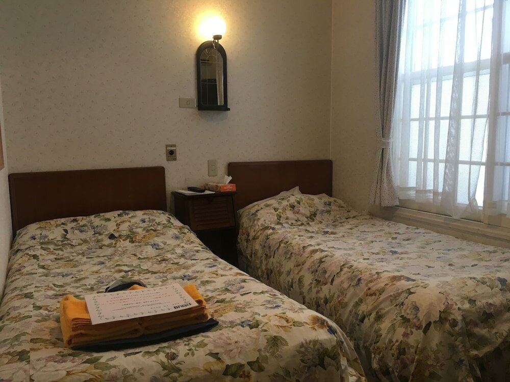 Фото Ishiuchi Pension Bruges