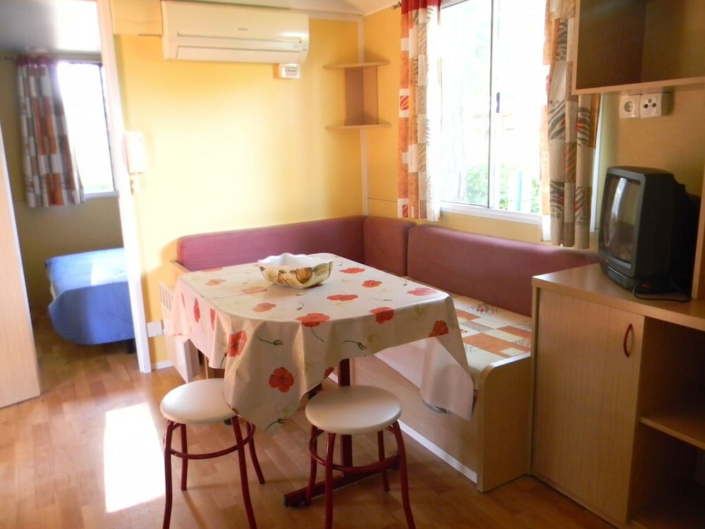 Фото Happy Camp in Camping Villaggio Thurium