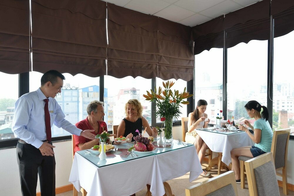 Фото Blue Hanoi Inn Hotel